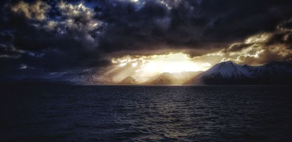 Scenic view of sea against sky during sunset