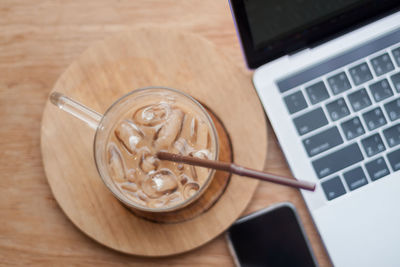 High angle view of coffee cup on table