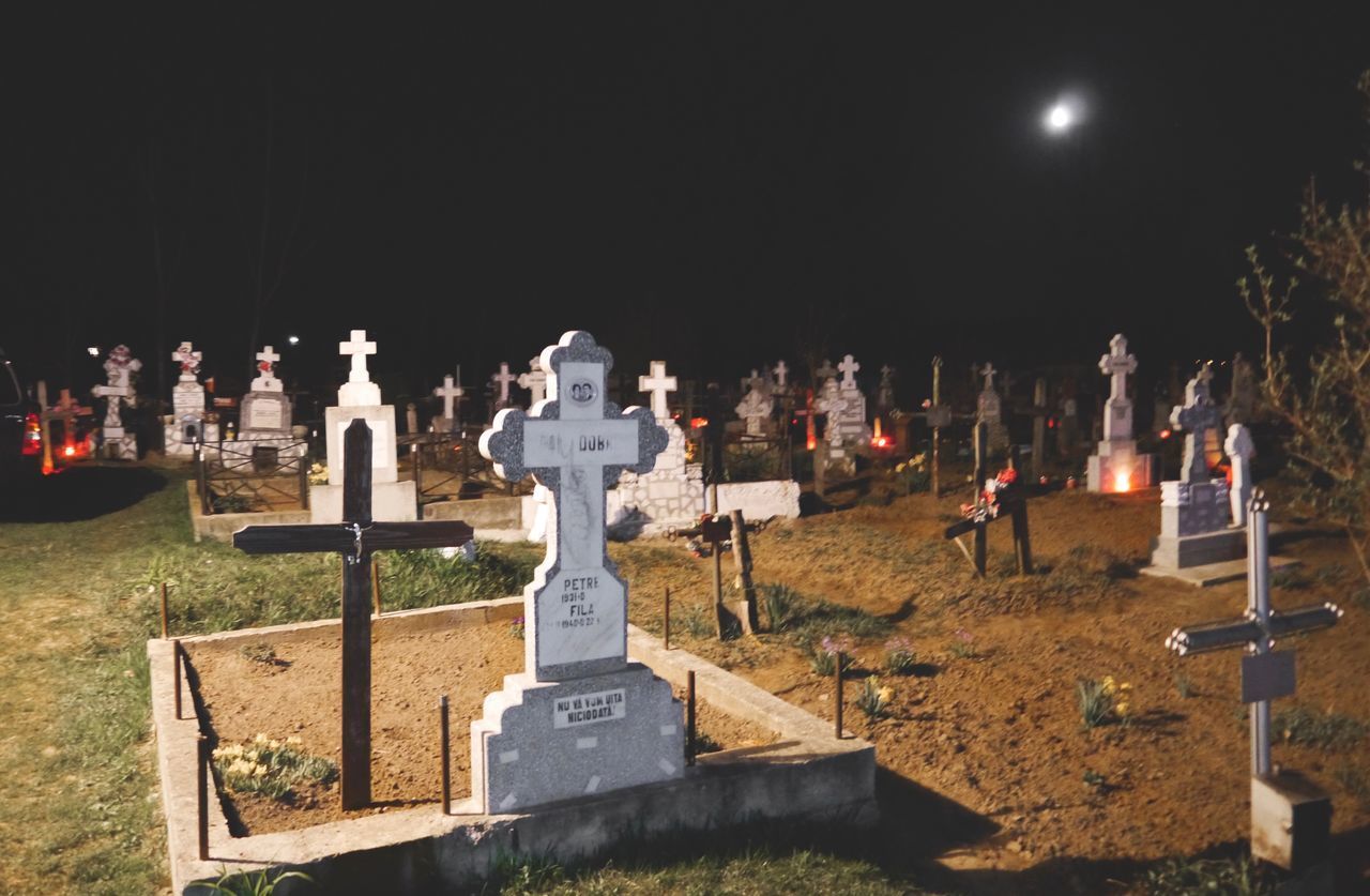 VIEW OF CROSS AT NIGHT