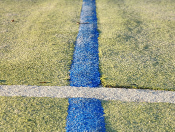 Border line in handball playing field. the outdoor handball playground plastic light green surface