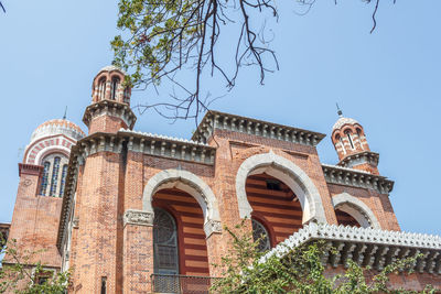 Low angle view of historic building against sky