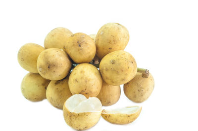 Close-up of fruits against white background