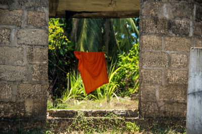 Clothes drying against built structure