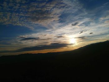 Scenic view of silhouette landscape against sky during sunset