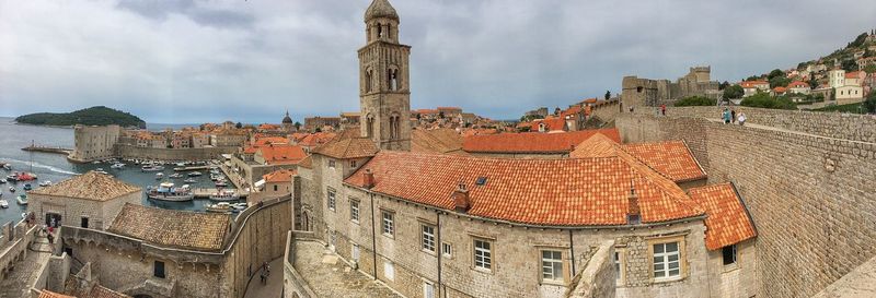 View of bell tower against cloudy sky
