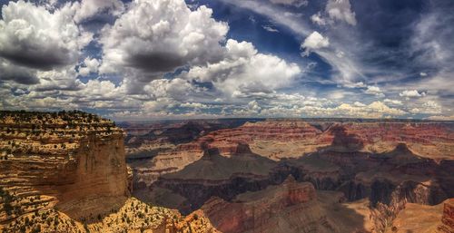 Panoramic view of landscape against dramatic sky