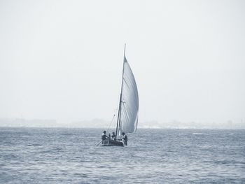 Boat sailing in sea