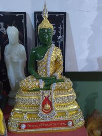 Close-up of buddha statue in store