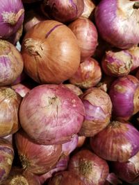 Full frame shot of onions for sale at market stall