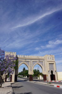 View of historic building in city against sky