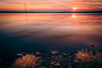 Scenic view of sunset over sea