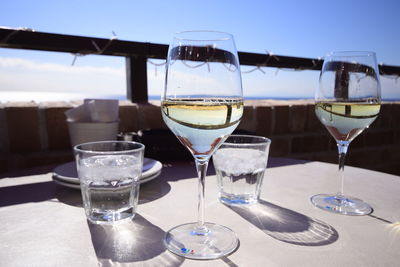 Close-up of beer glass on table