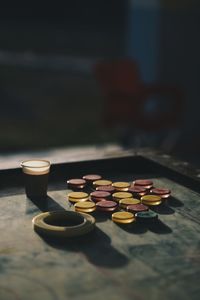 Close-up of coins on carom board
