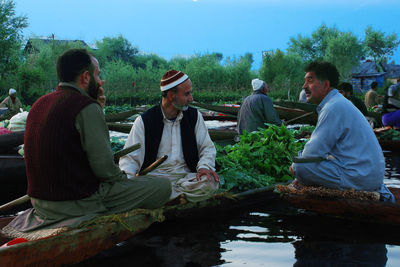 Negotiating for a good price can see at a floating market every morning in dal lake. 