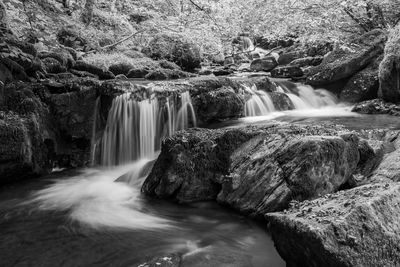 Long exposure of a waterfall on the hoar oak water river flowing through the woods at watersmeet 