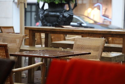 Empty chairs and tables at cafe