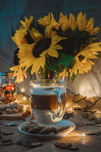 Close-up of flowers in vase on table