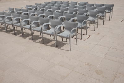 Empty auditorium chairs outdoors