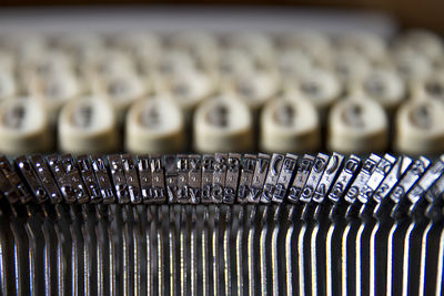 Close-up of typewriter in row