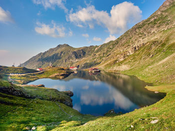 Panoramic view of lake and mountains against sky