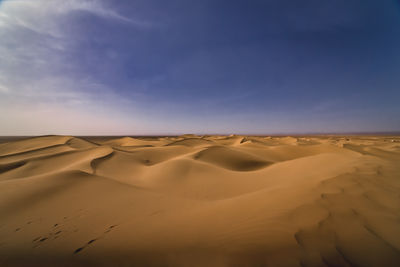 Scenic view of desert against sky