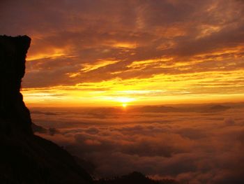 Scenic view of dramatic sky during sunset