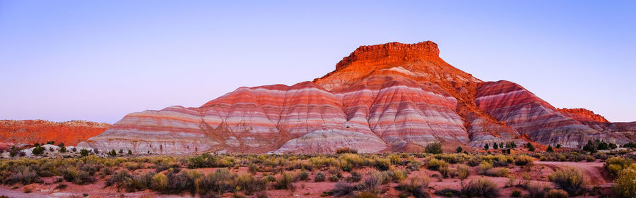 Rock formations on mountain against sky