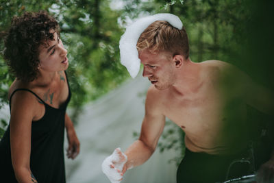 Young couple kissing in water