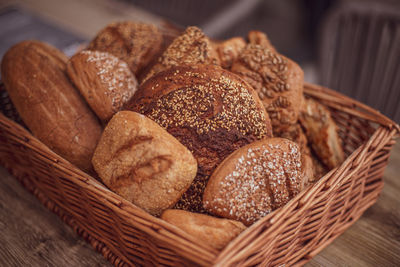 Close-up of cookies in wicker basket on table