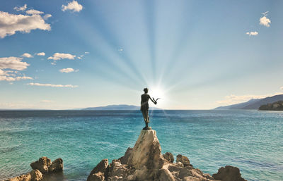 Statue on the sea