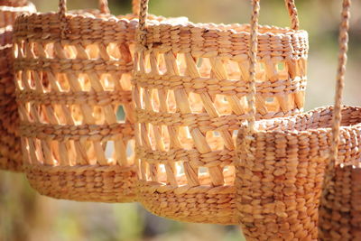 Close-up of wicker basket hanging for sale