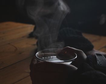 Close-up of person holding tea cup