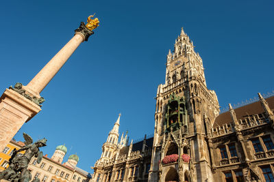 Marienplatz with marian column frauenkirche new town hall in munich