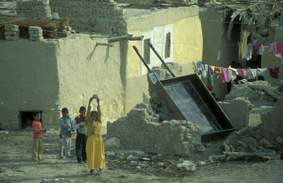 High angle view of woman walking on street