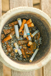 High angle view of cigarette in container