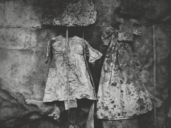 Close-up of clothes hanging on wall