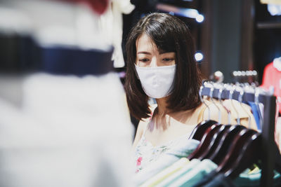 Portrait of woman standing outdoors