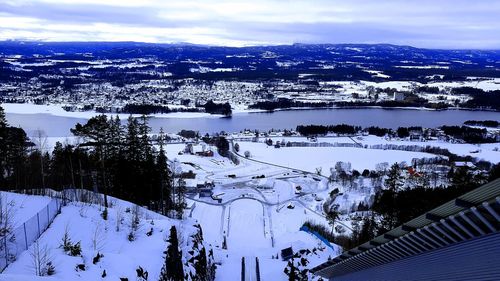 Scenic view of snowcapped mountains against sky during winter