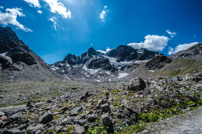 Panoramic view of rocky mountains against sky