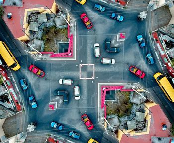 High angle view of cars on street in city