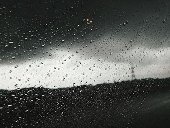 Close-up of water drops on glass window