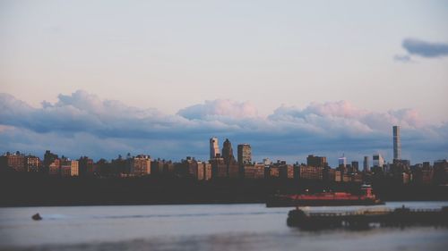 Panoramic view of buildings in city against sky