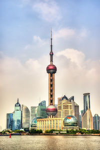 View of buildings against sky in city