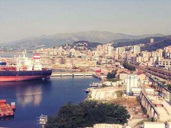 High angle view of bay and buildings in city