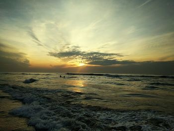 Scenic view of sea at sunset