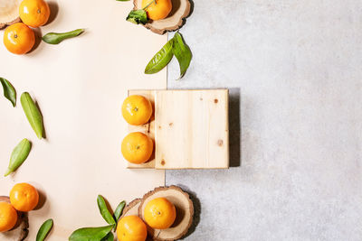 High angle view of fruits and leaves on table