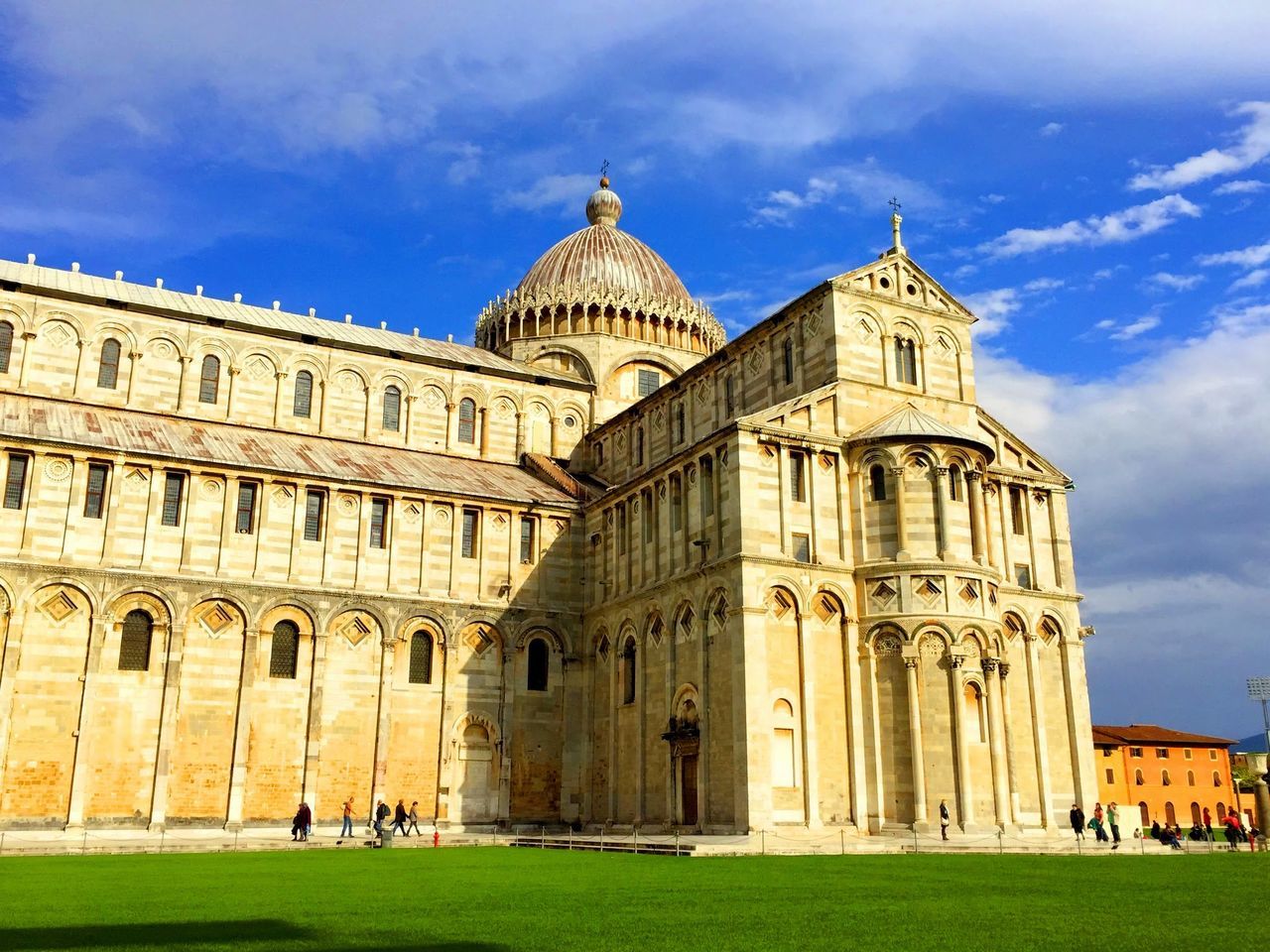 architecture, building exterior, built structure, famous place, sky, travel destinations, place of worship, religion, history, tourism, spirituality, travel, dome, facade, grass, international landmark, cloud - sky, church, cathedral