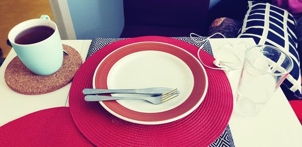 High angle view of coffee cup on table