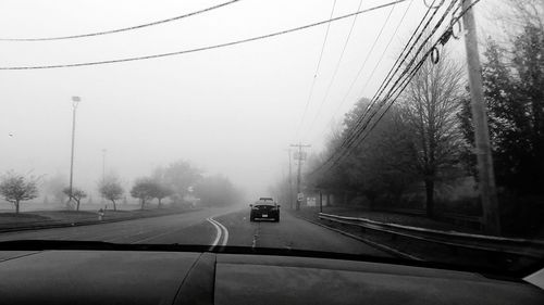 Road passing through forest