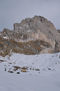 Scenic view of snowcapped mountains against sky. winter hike around seceda, south tyrol, italy